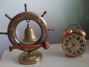 Ship steering whell, bell and alarm clock